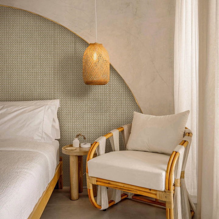 Nursery room with wooden crib, white bedding, and decorative elements.