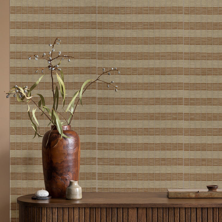 GoDear Decorative vase with branches on a wooden surface against a striped wallpaper background