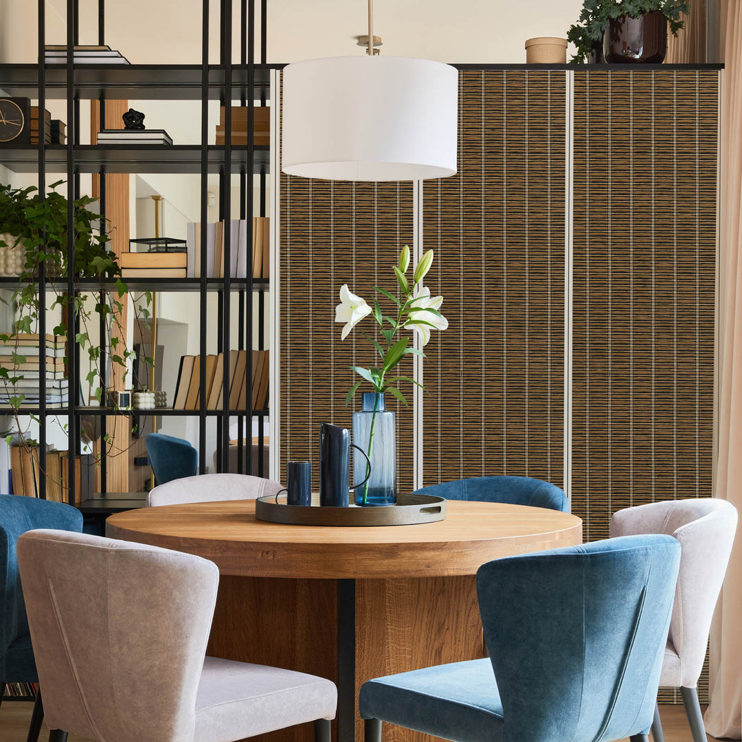 Dining area with a wooden table and chairs in a room with a room divider.