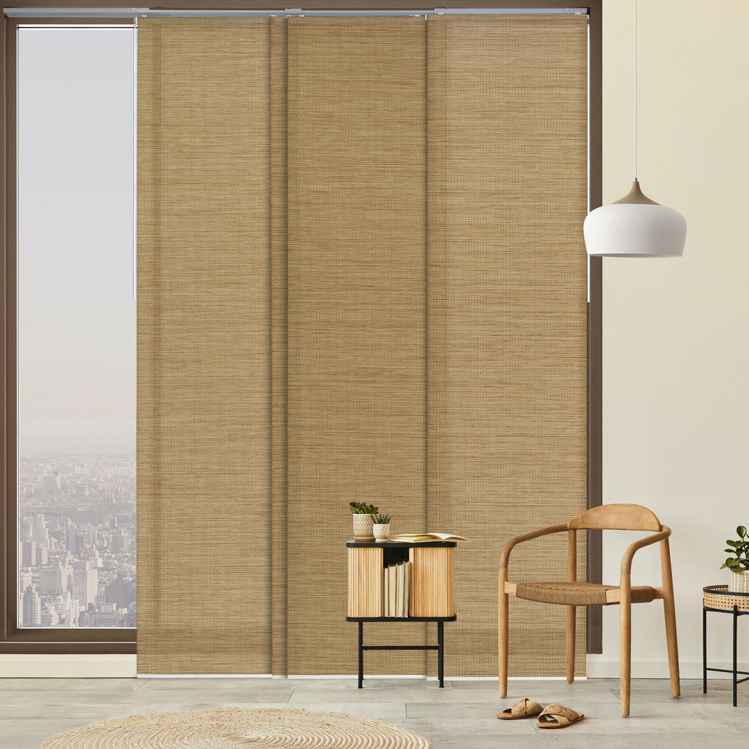 GoDear Design_Brown woven blinds covering a large window with a modern interior design.