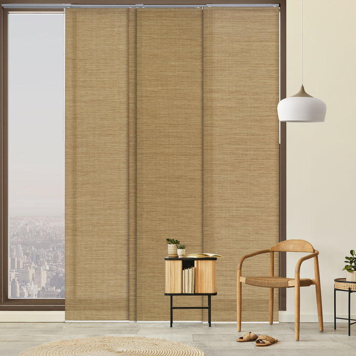 GoDear Design_Brown woven blinds covering a large window with a modern interior design.