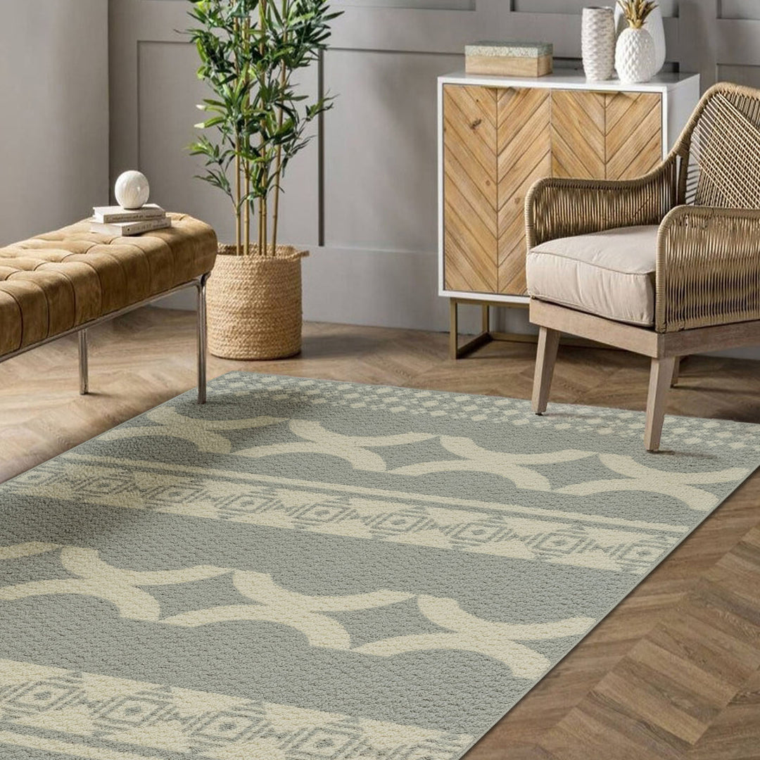 Living room with a patterned rug, wooden chair, and side table.