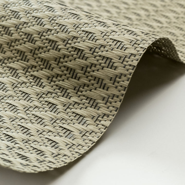 Close-up of textured woven material on a white background