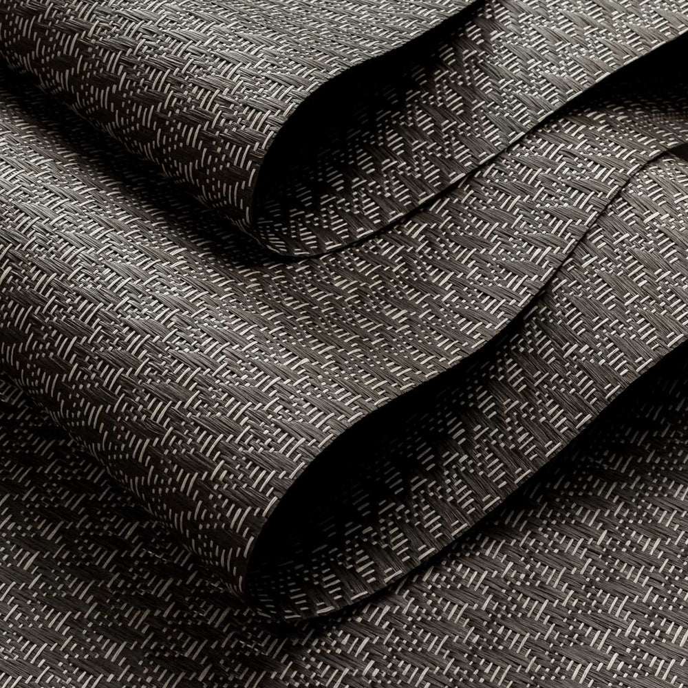 Dark gray textured fabric with a subtle pattern