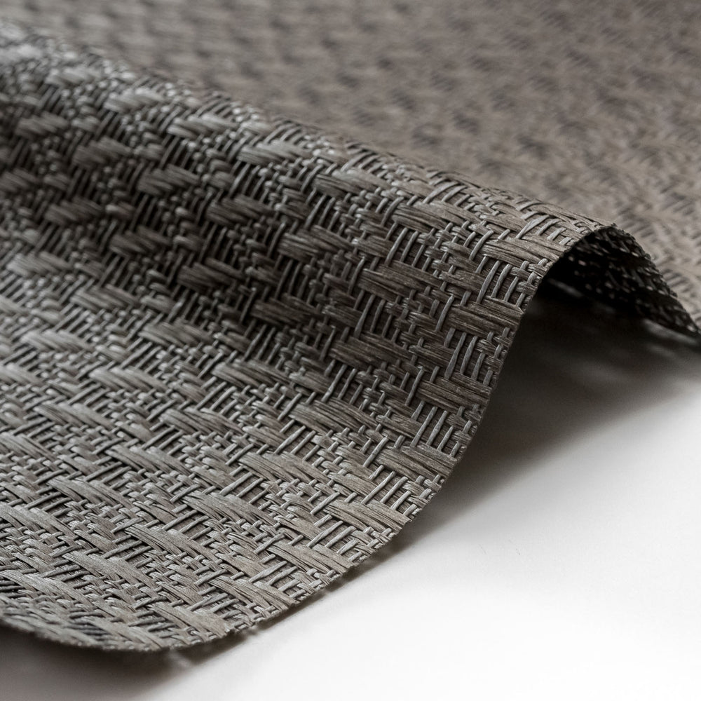 Close-up of textured gray fabric on a white background