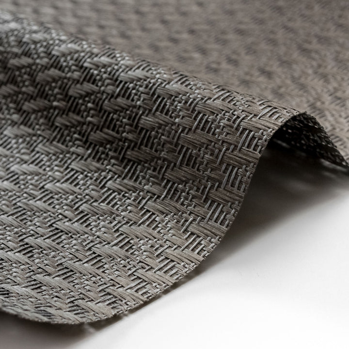 Close-up of textured gray fabric on a white background