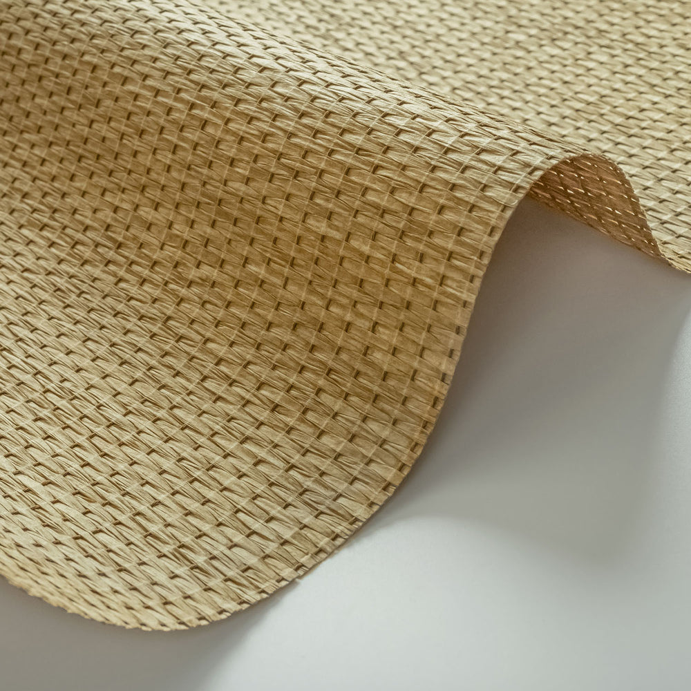 GoDear Design_Close-up of woven beige material on a white background