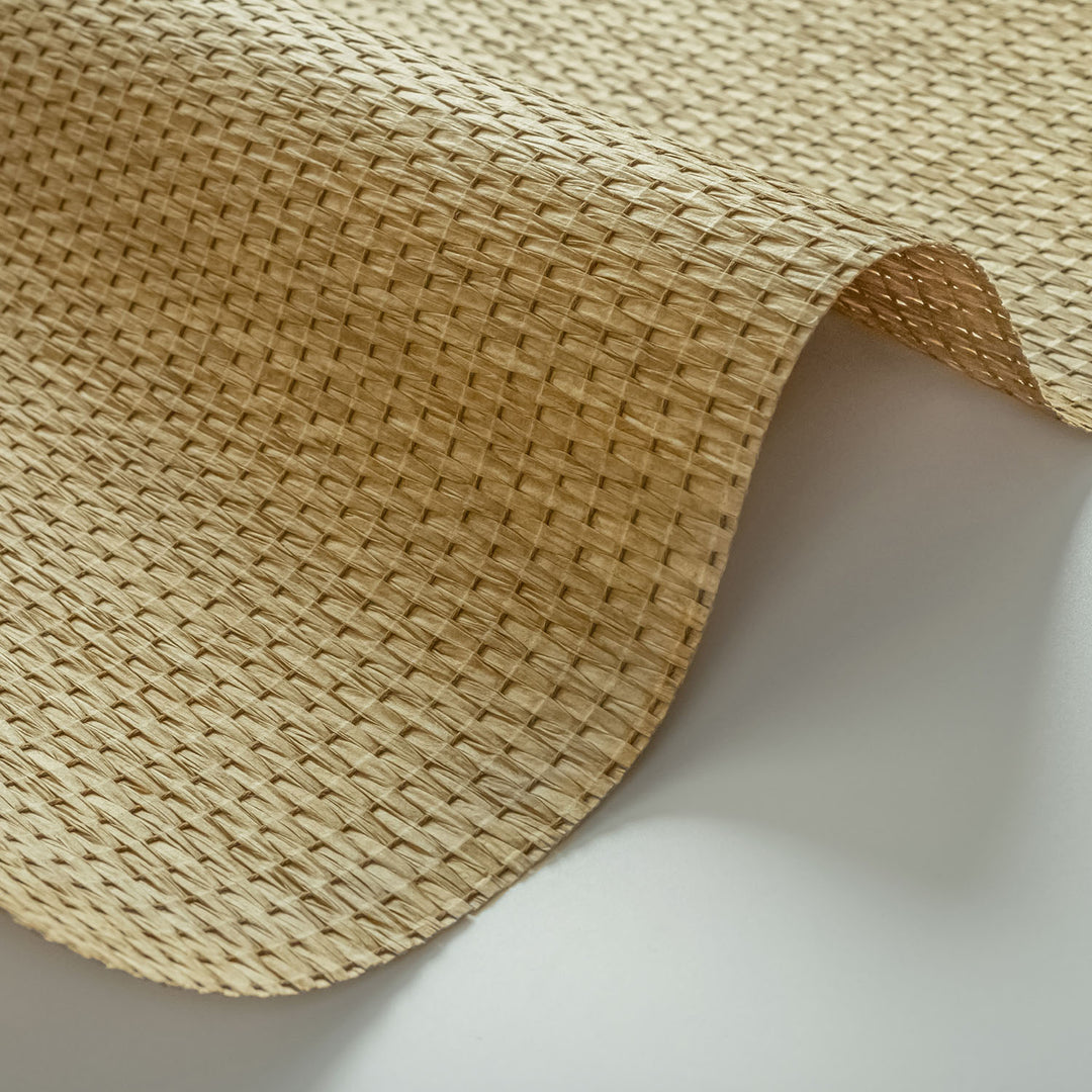 GoDear Design_Close-up of woven beige material on a white background