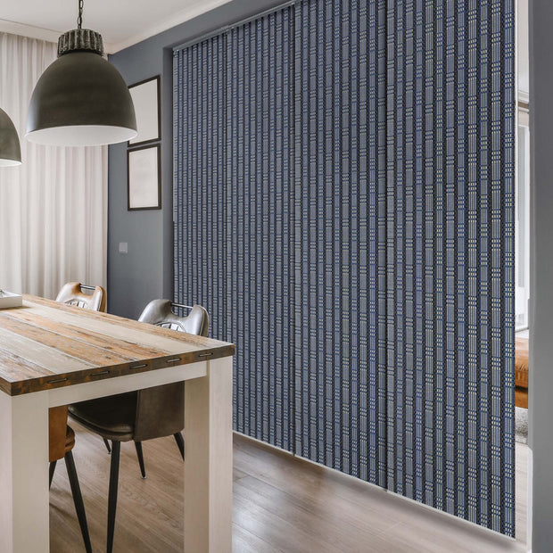 GoDear Design Dining room with a textured blue wall panel and wooden table.