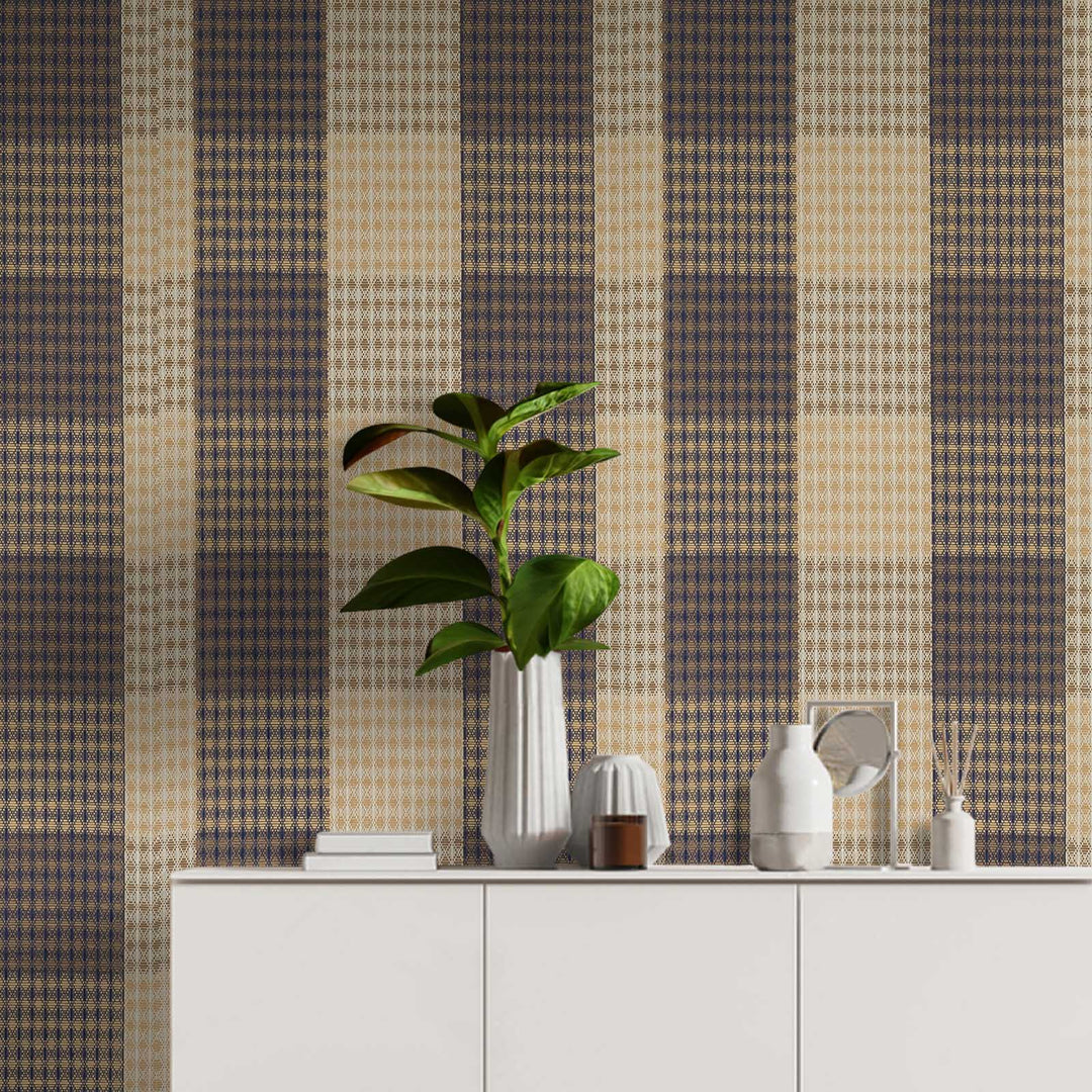 Checkered wallpaper with a plant and decorative items on a white cabinet