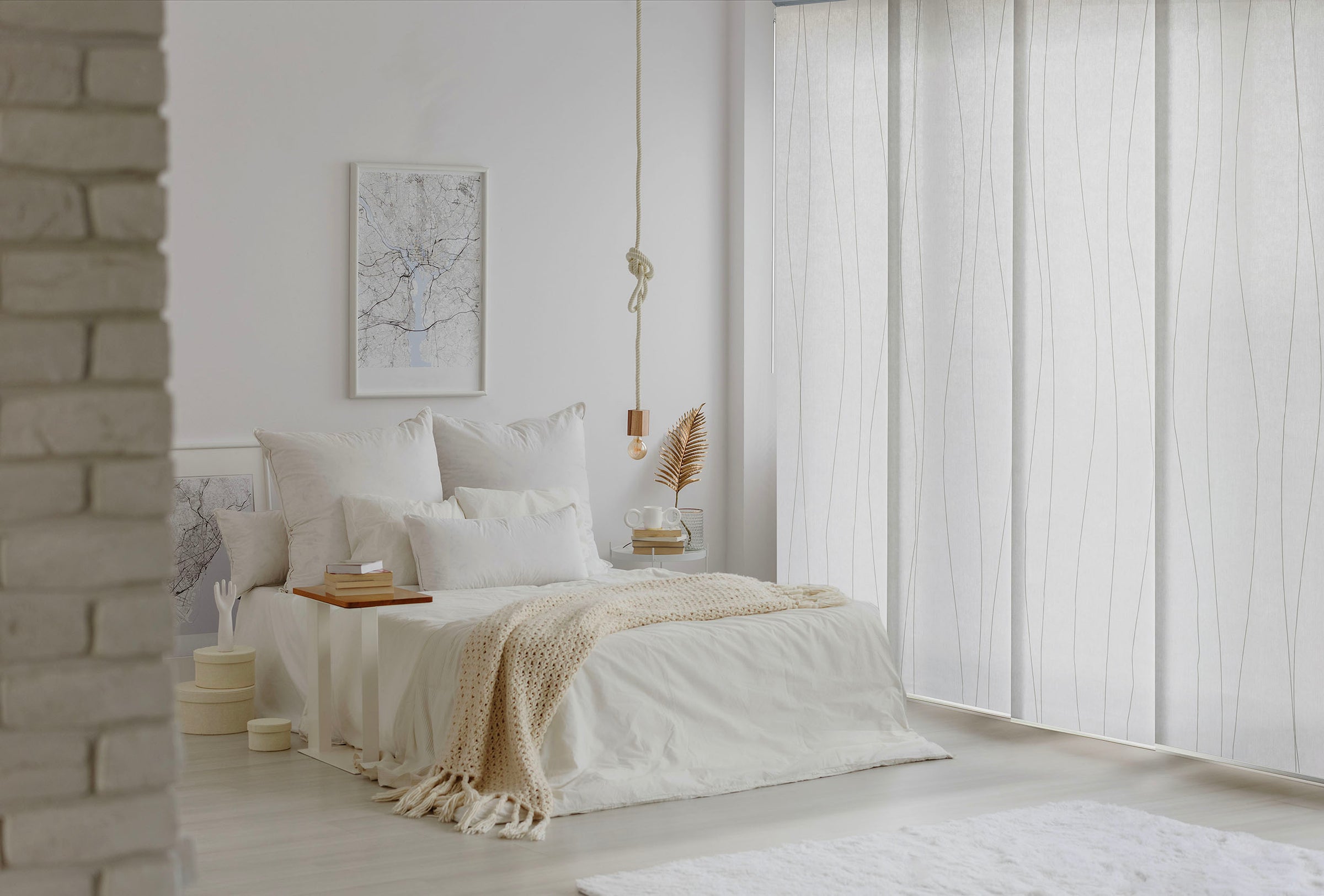 GoDear Design_Neatly made bed in a bedroom with light decor