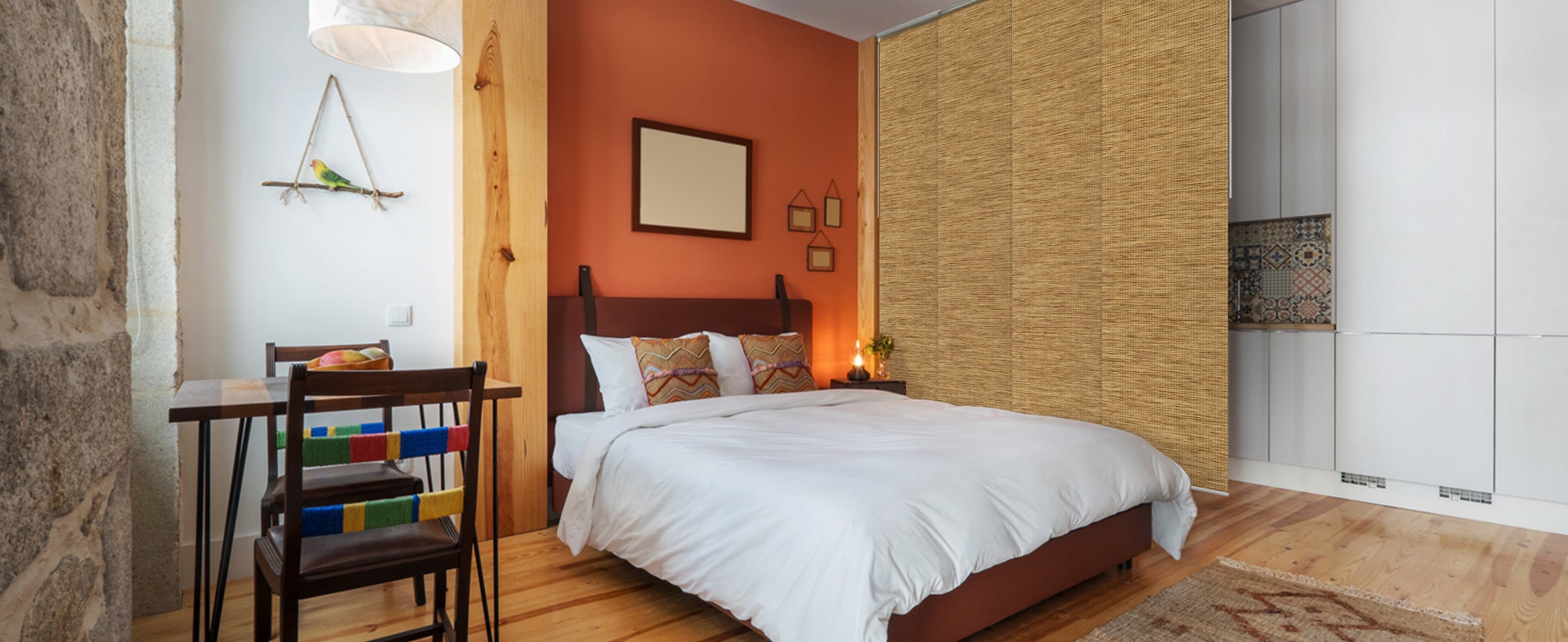 GoDear Design_Modern bedroom with a bed, desk, and colorful books.