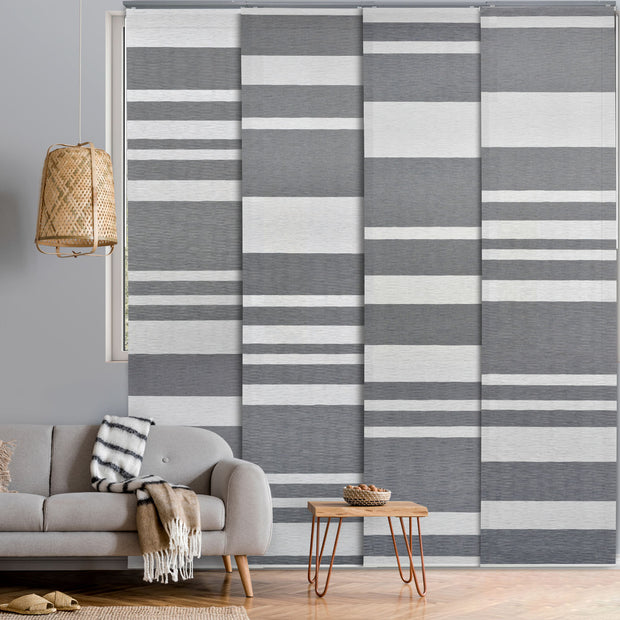 GoDear Design Living room with a striped wall panel and a sofa.