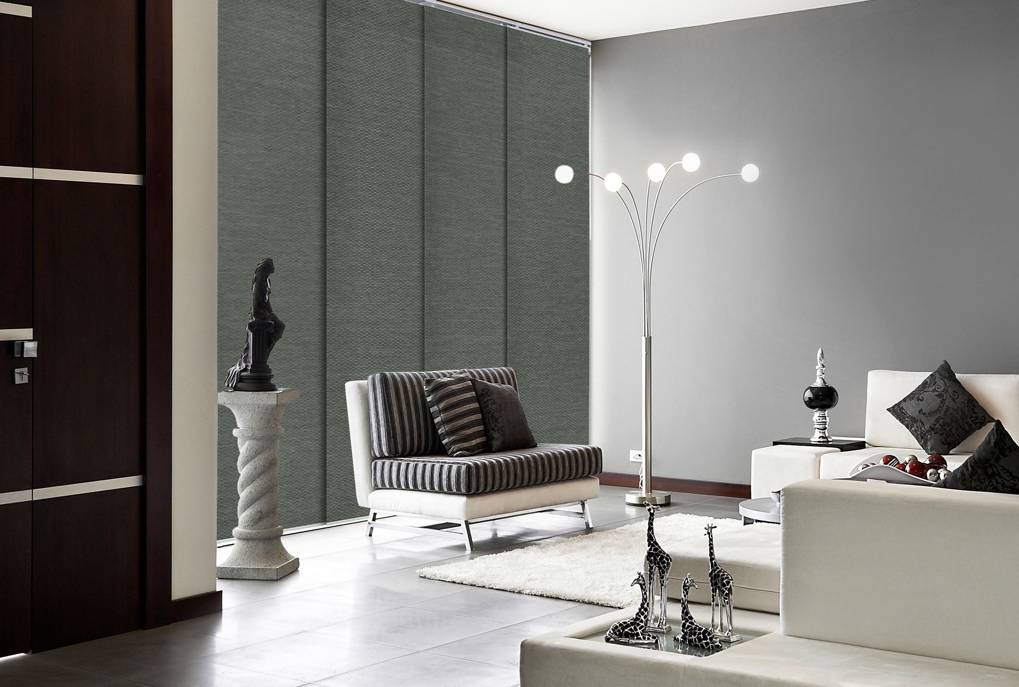 GoDear Design_Modern living room with gray walls, white furniture, and decorative items.