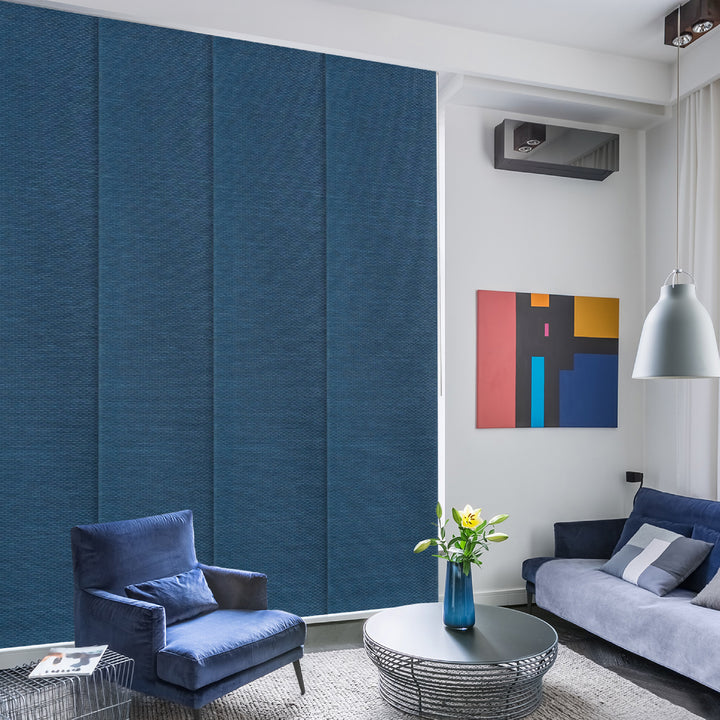 GoDear Design Modern living room with blue walls, a sofa, and a coffee table.
