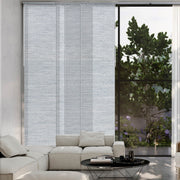 GoDear Modern living room with a large window featuring white vertical blinds and a view of greenery outside.