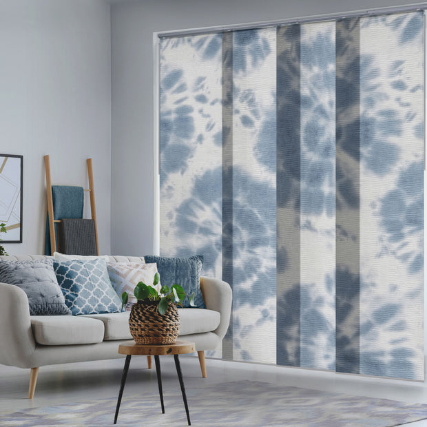 GoDear  Living room with a sofa, coffee table, and tie-dye patterned window blinds.