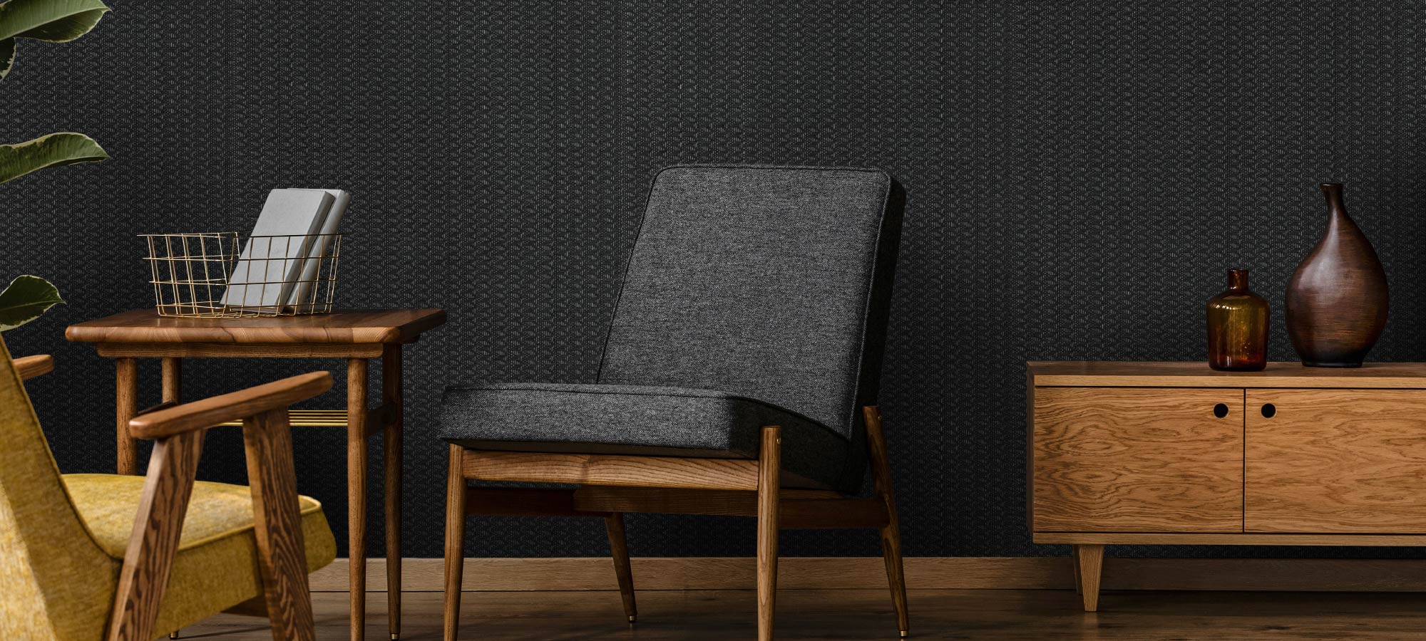 Modern reading corner with dark textured wall, wooden sideboard, mid-century chairs, and decorative vases creating a cozy interior style.