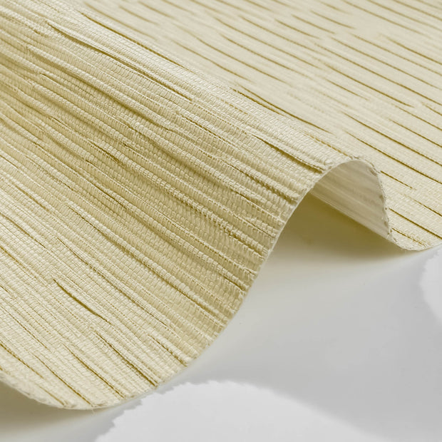 A close-up shot of GoDear Design's "Frangipani" decorative material, showing the intricate, light beige woven pattern. The image highlights the natural, paper-based texture and high-quality craftsmanship of the product, with a slight pleat showing its flexibility and subtle vertical lines.