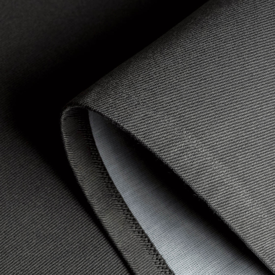 GoDear Design Close-up of gray fabric with a subtle pattern
