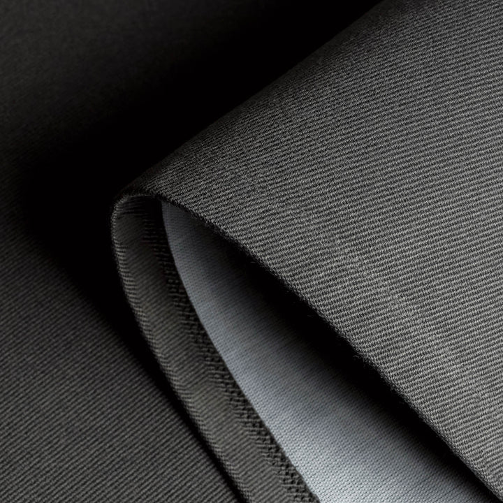 GoDear Design Close-up of gray fabric with a subtle pattern