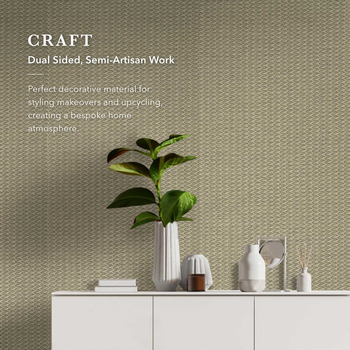 Decorative wallpaper with text about dual-sided, semi-artisan work and a plant on a shelf.