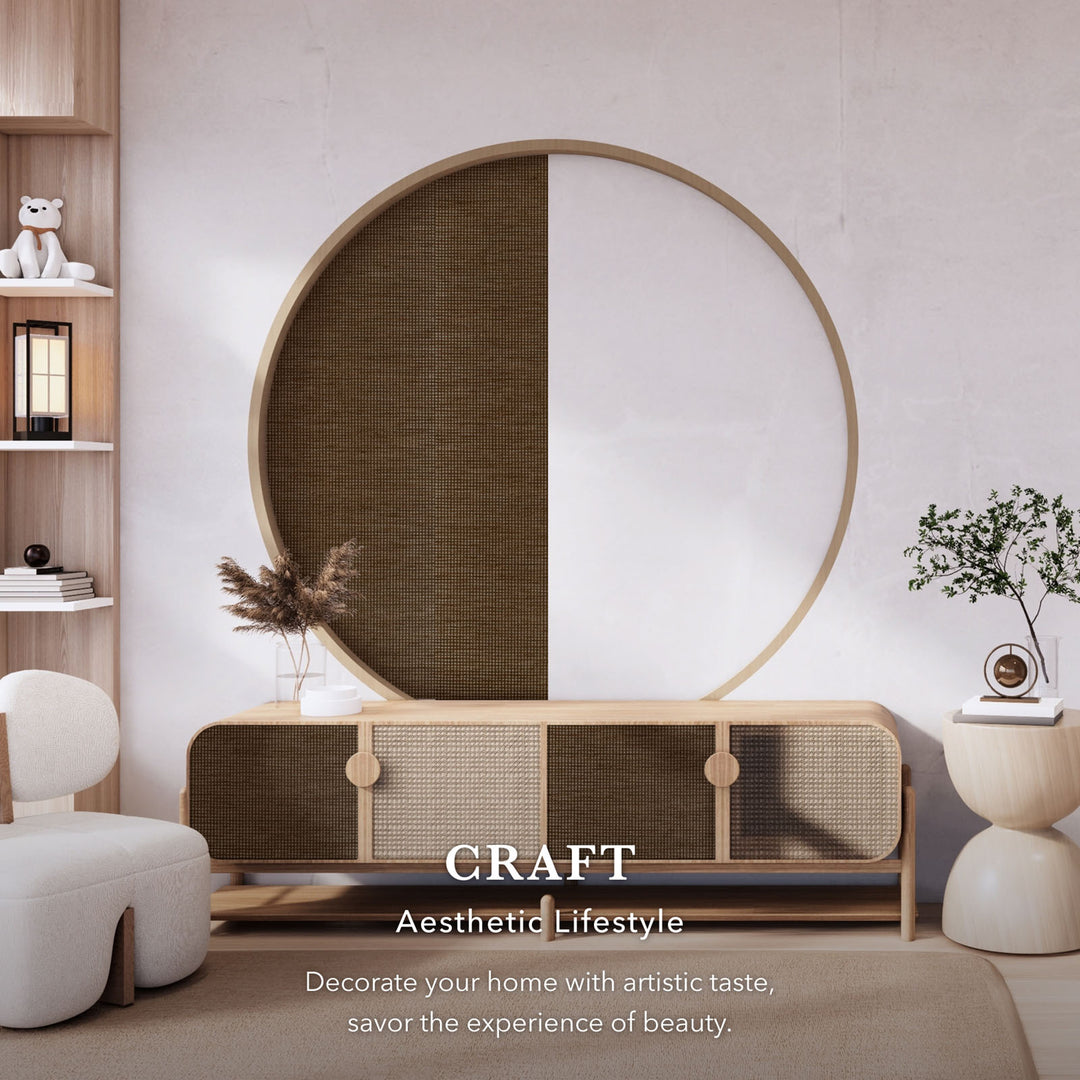 Modern interior design with a round mirror and wooden furniture.