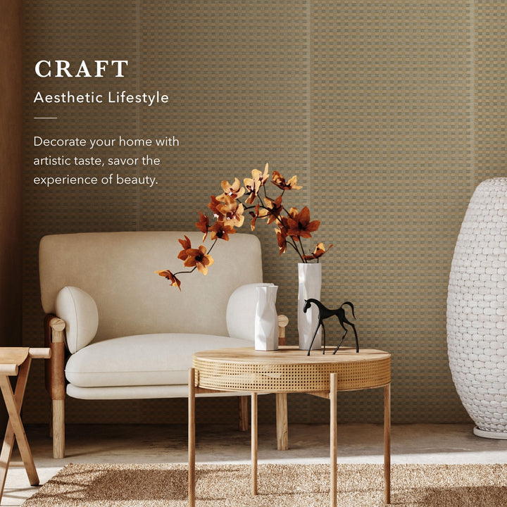 Living room with beige sofa, wooden coffee table, and decorative elements against a textured wall.