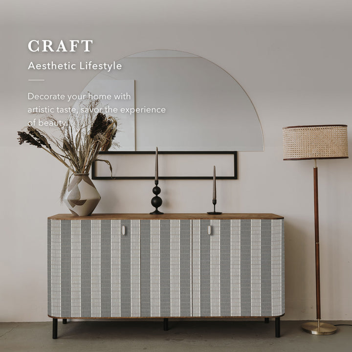 GoDear Modern interior with a sideboard, lamp, and decorative items against a neutral wall.