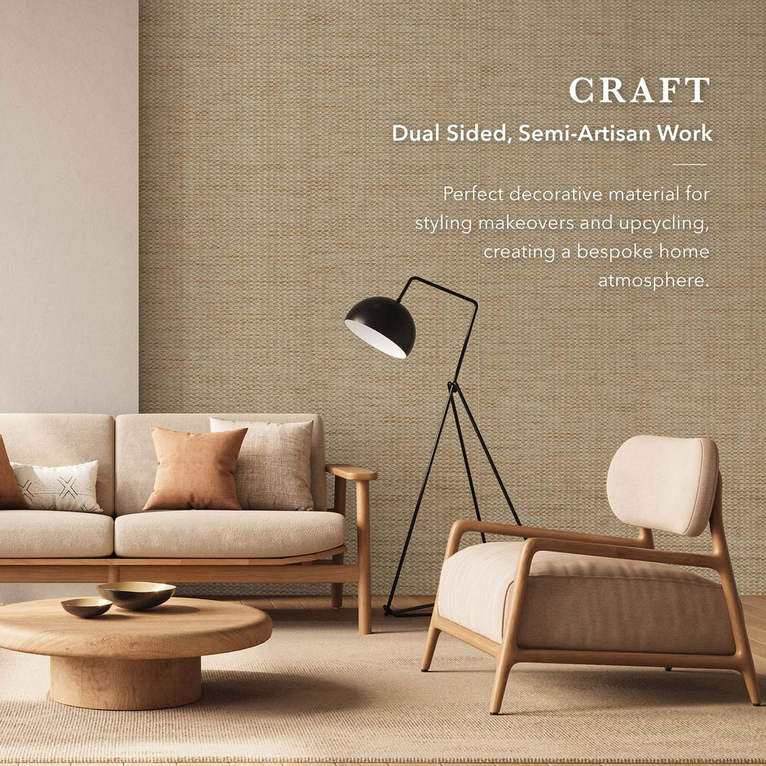 Modern living room with beige textured wallpaper, wooden furniture, black floor lamp, and text overlay describing dual sided semi-artisan decorative fabric.