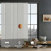 GoDear Design Modern interior with a large window, gray woven blinds, and decorative items.