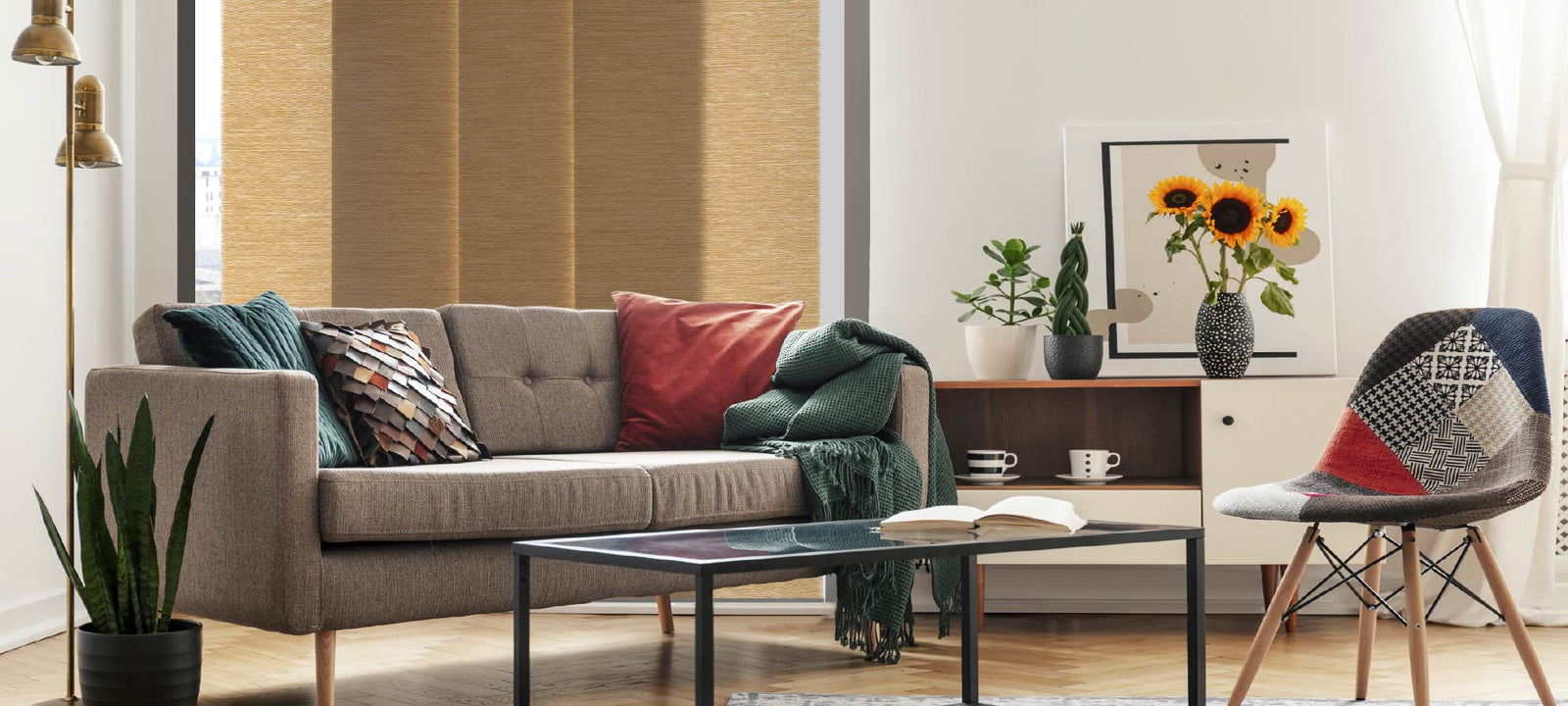 Twist Roll semi-sheer panel blinds in a golden wheat tone, installed in a cozy living room with mid-century modern furniture and playful colorful accents.