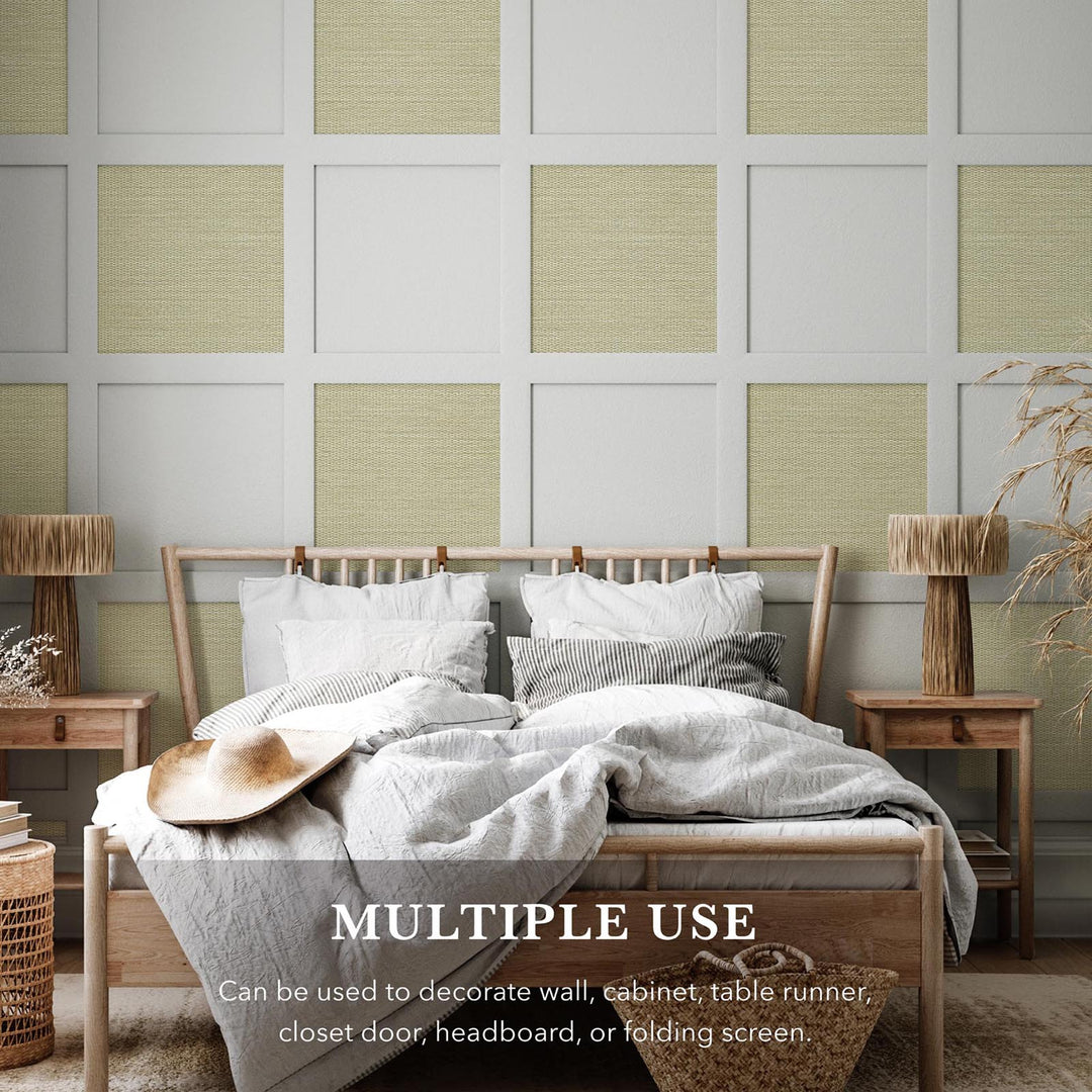 Bedroom with wooden headboard, white bedding, and decorative elements on a wall with geometric pattern.