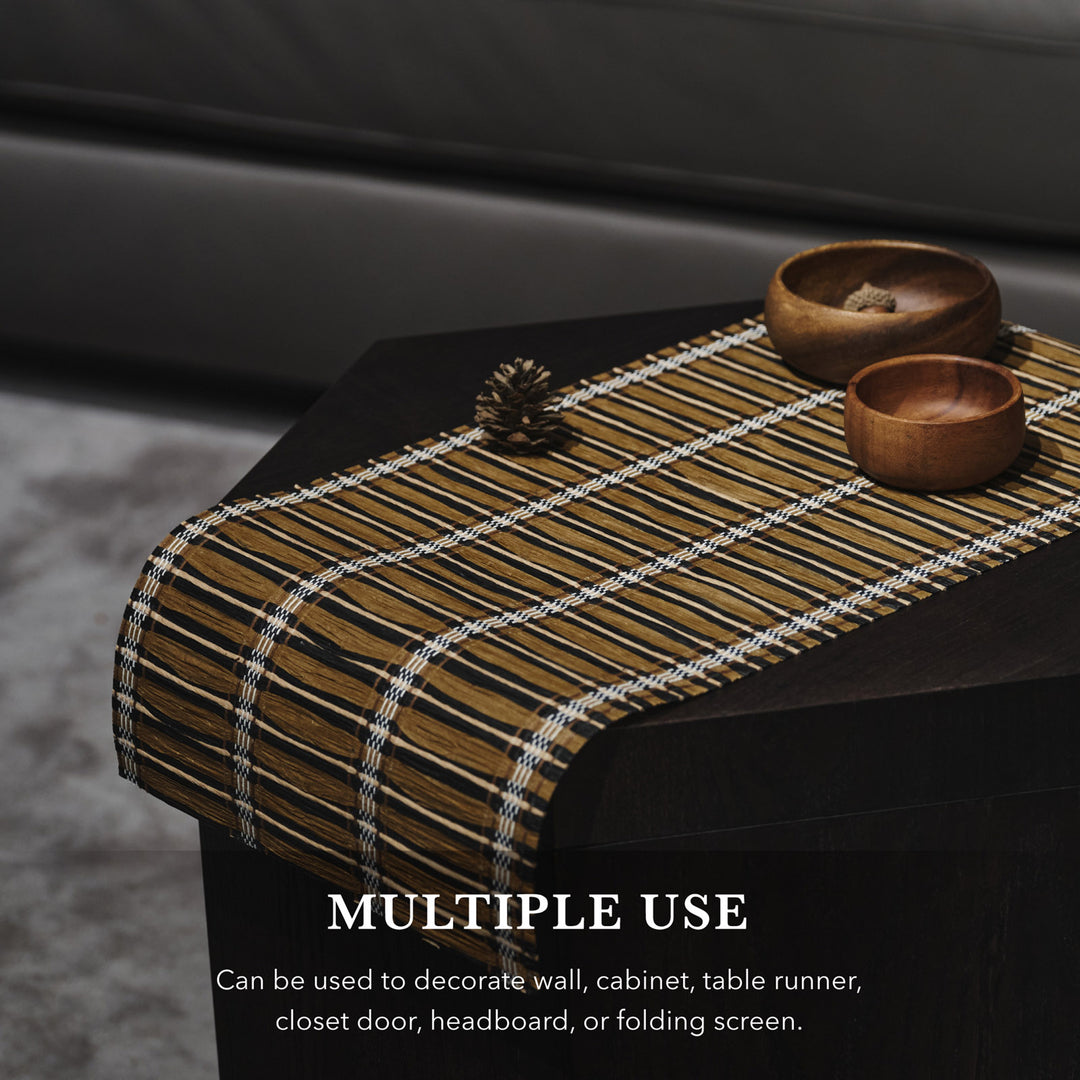 Decorative item with striped pattern on a dark surface, featuring text about multiple uses.