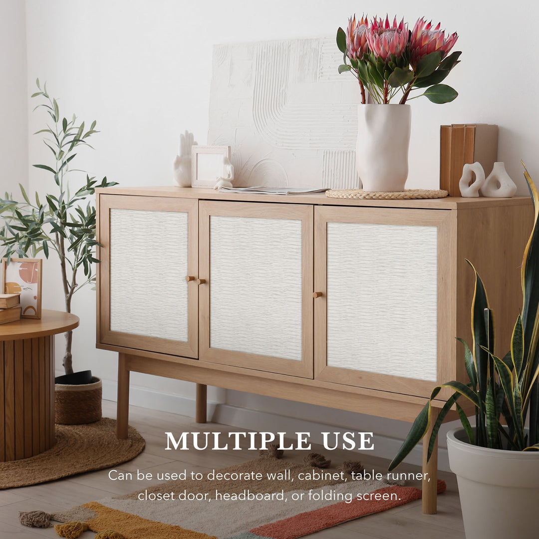 Wooden cabinet with decorative items in a room setting