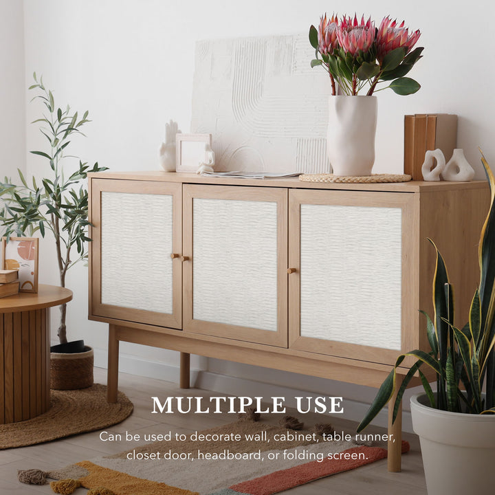 Wooden cabinet with decorative items in a room setting
