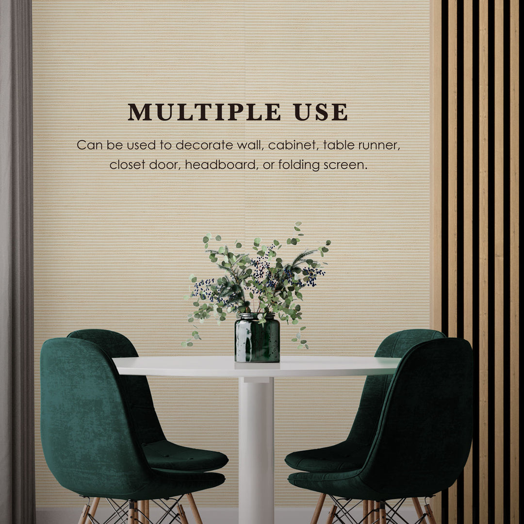 Decorative wall decal with text and a vase of flowers on a table.