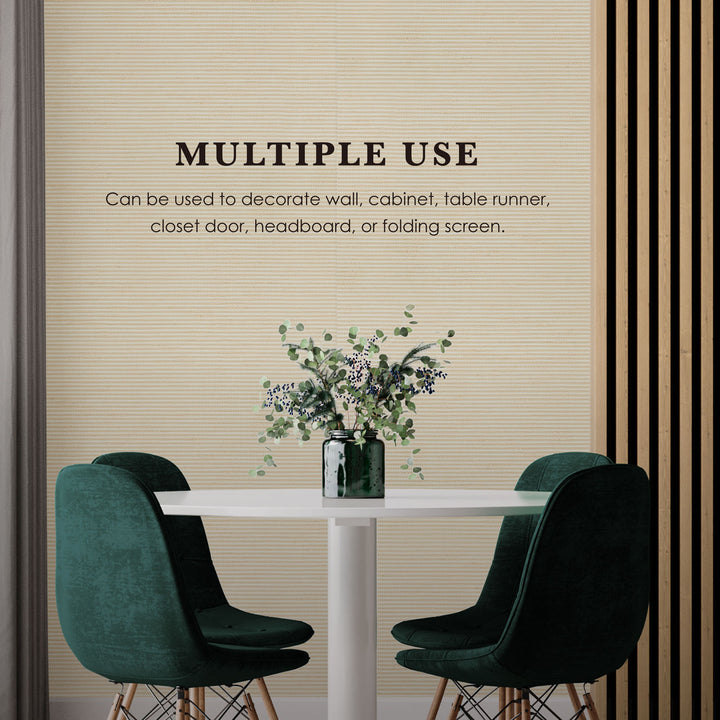 Decorative wall decal with text and a vase of flowers on a table.