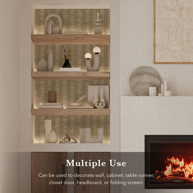 Built-in wooden shelves with decorative items and a back panel covered in natural textured vertical stripe wallpaper, next to a modern fireplace.