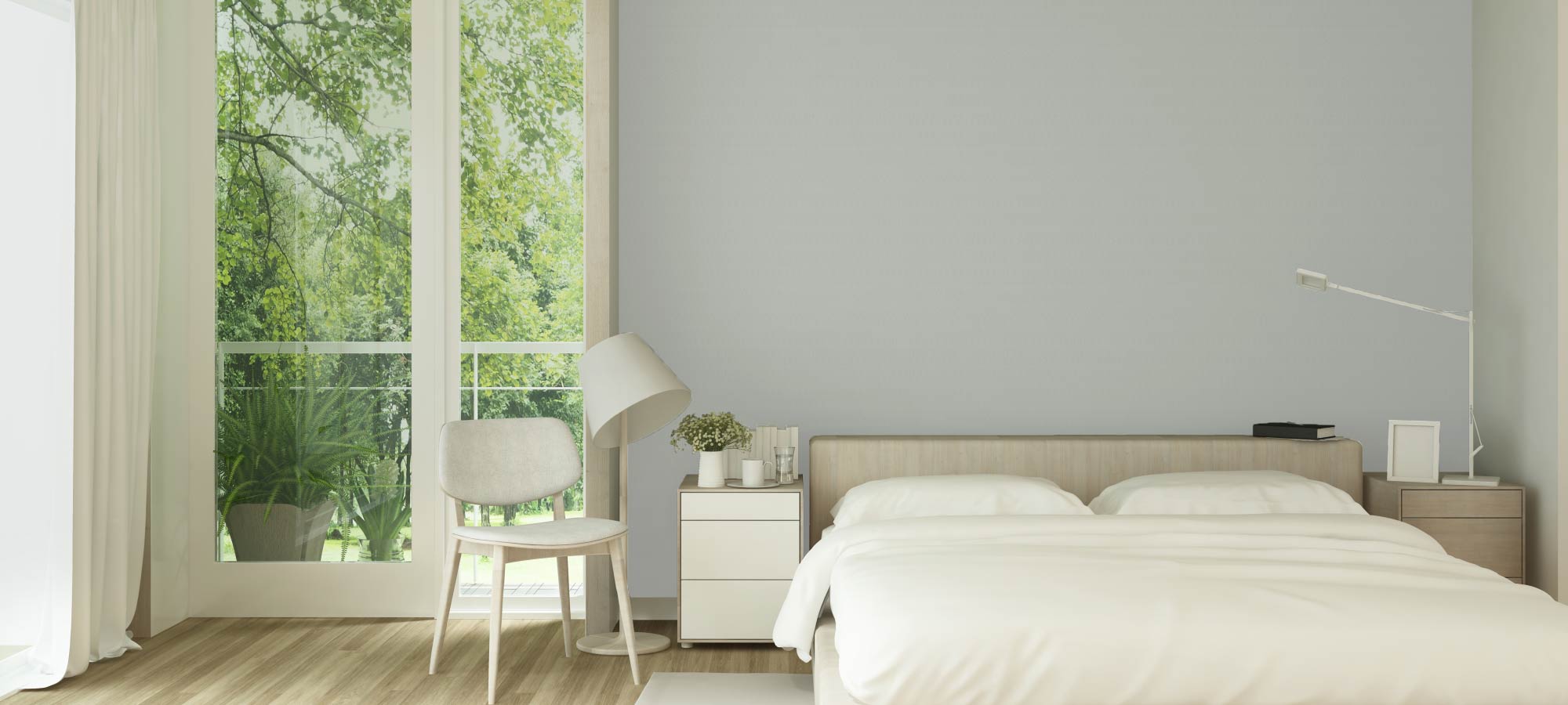 Bright modern bedroom with large window view of greenery, minimalist furniture, white bedding, and a soft neutral wall accent.