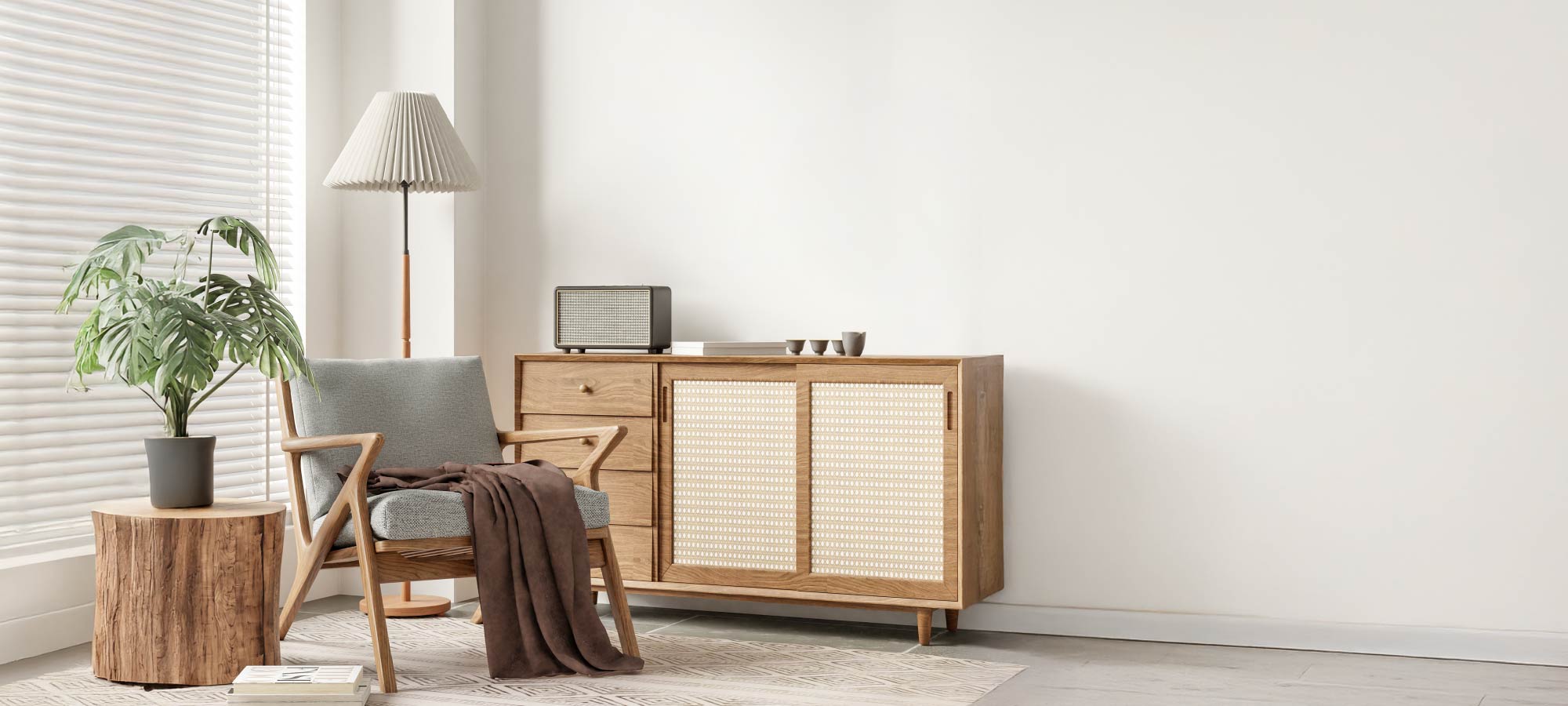 Bright modern interior with wooden cabinet, mid century armchair, indoor plant, and natural textures creating a minimalist living corner.