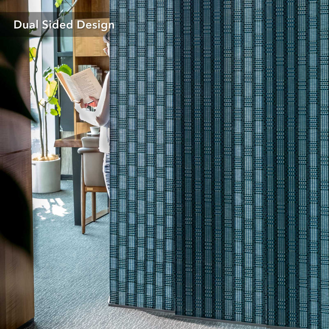 GoDear Design Patterned blue curtain partially covering a room with a dining table and chairs.