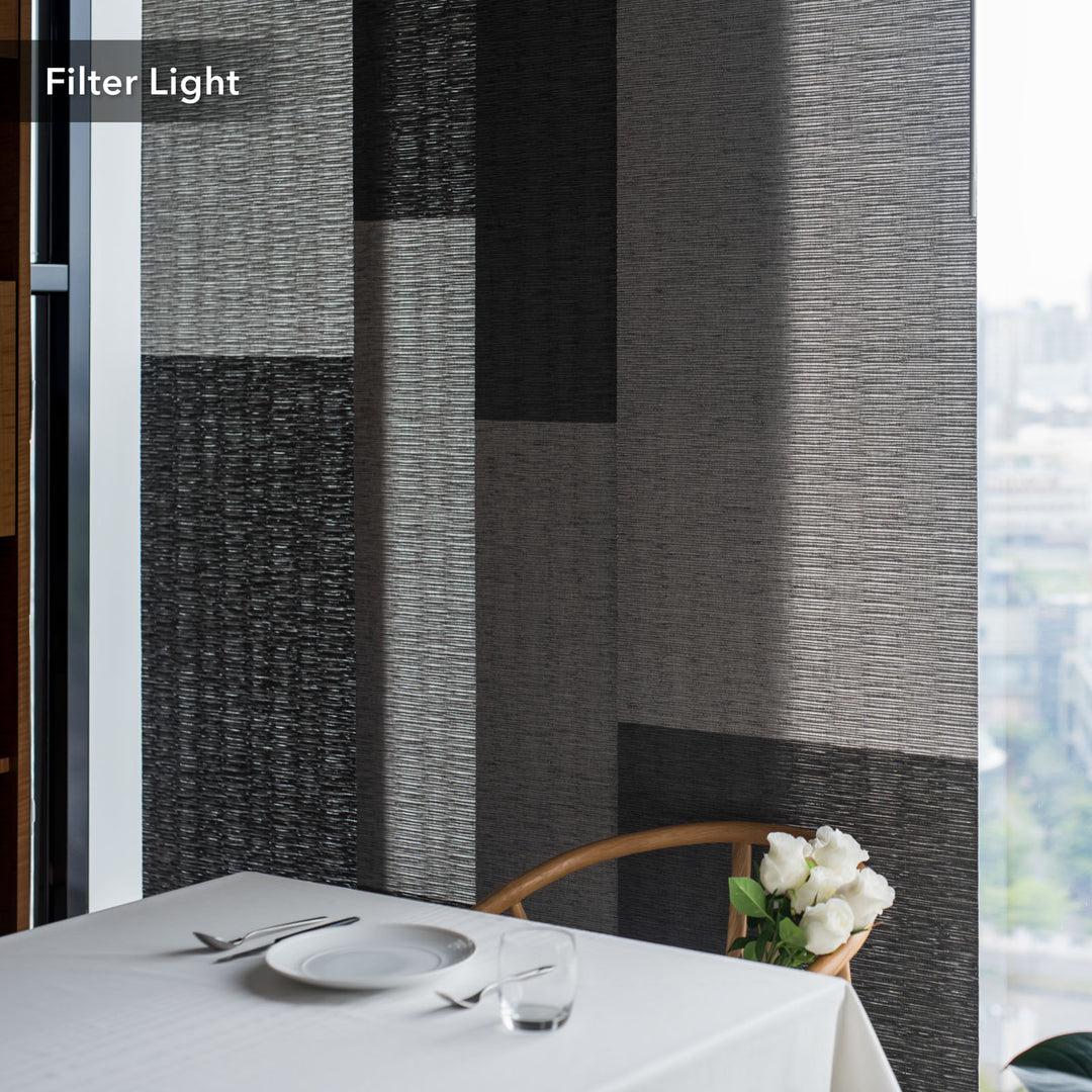 GoDear Design Dining table setting with a textured gray wall in the background