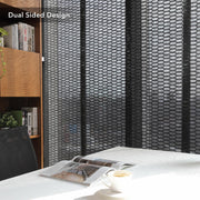 GoDear Design Room with a bed, bookshelf, and patterned wall