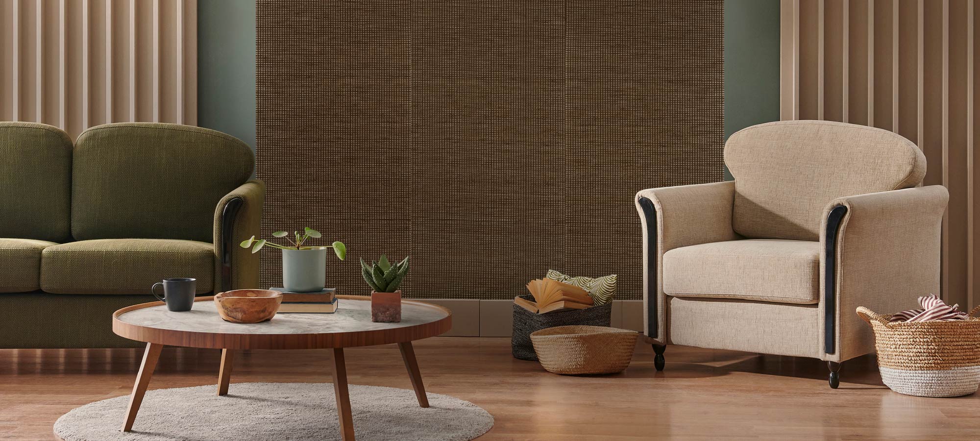 Living room with a beige armchair, green sofa, and wooden coffee table.