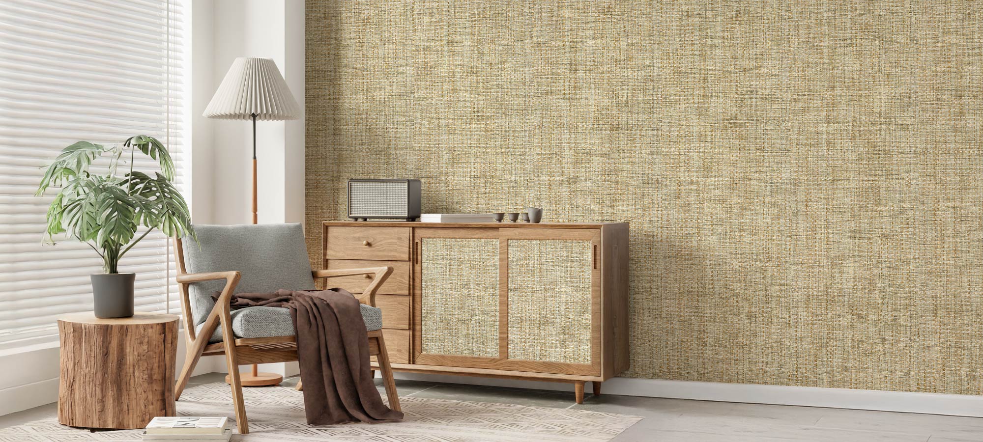 Bright scandinavian style living room with textured wall, wooden sideboard, mid century armchair, indoor plant, and natural light from window blinds.
