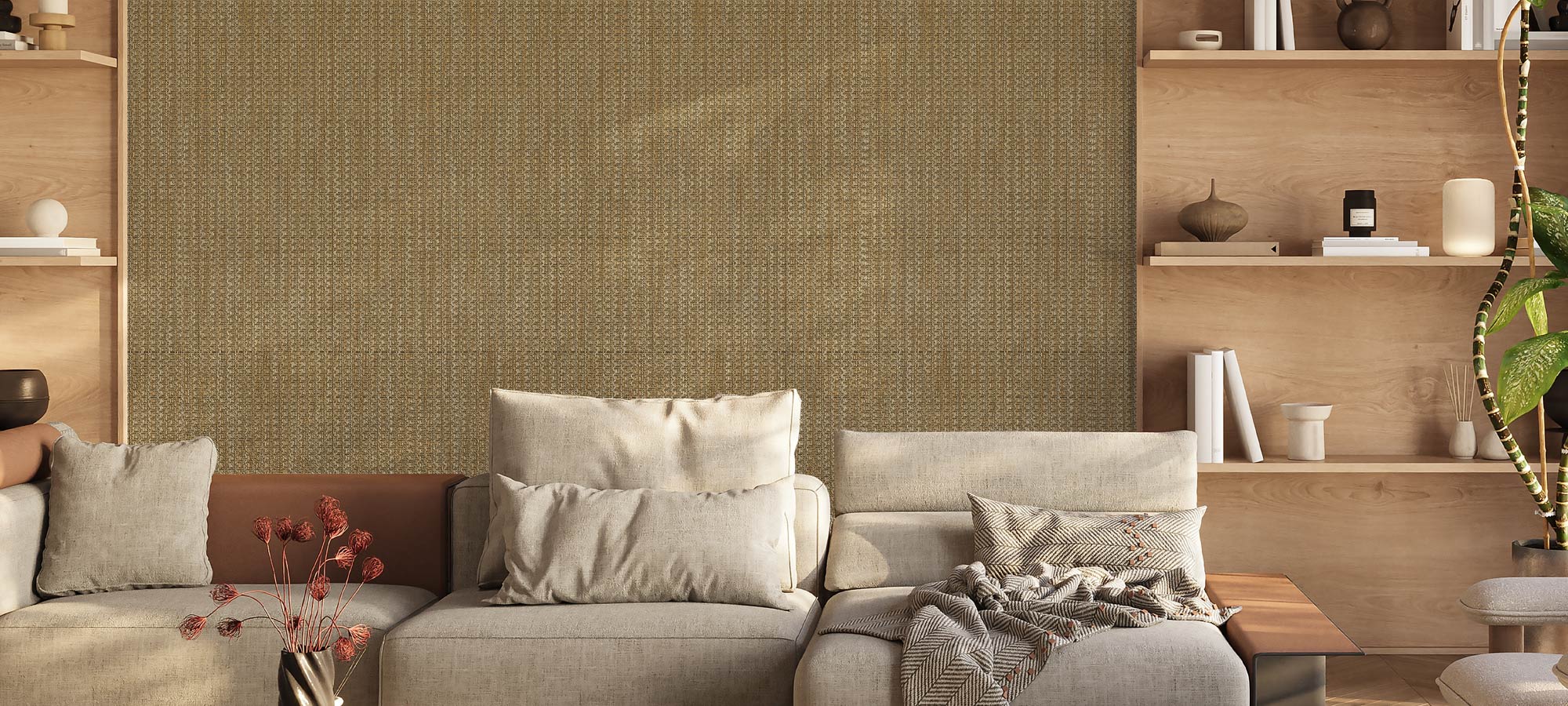 Cozy living room with woven textured wall, beige sectional sofa, wooden shelving with decorative objects, and natural light creating a warm atmosphere.