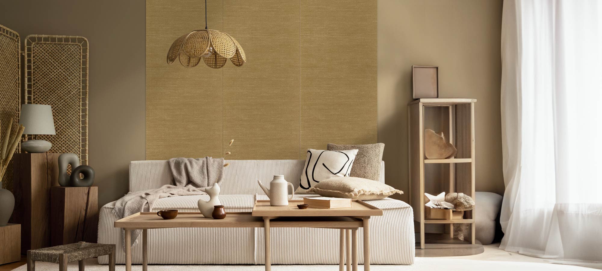 Modern living room with woven textured accent wall, neutral sofa, wooden coffee table, rattan pendant light, and minimalist natural decor.