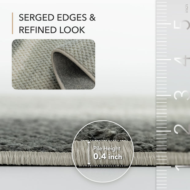 Gray rug with serged edges and refined look, showing pile height measurement.