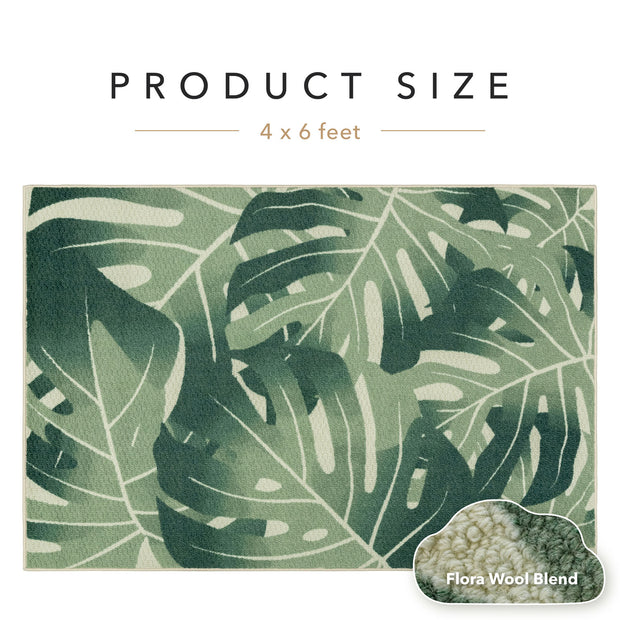 Green leaf-patterned rug with product size label and wool blend information.